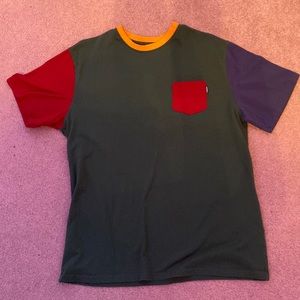 green, red, orange, and blue color-blocked t-shirt